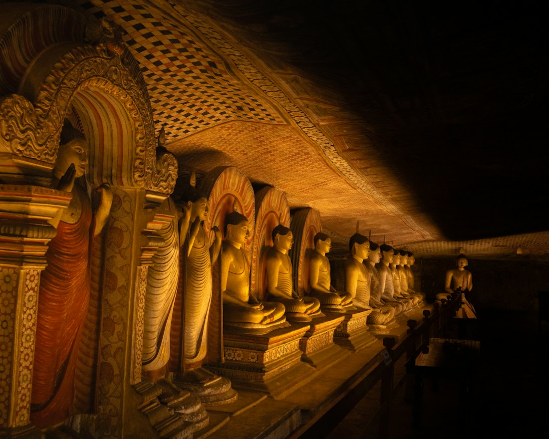 Golden Buddha statues inside the Dambulla cave temple